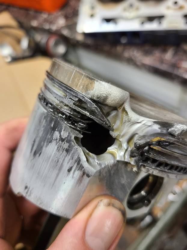 Attached picture Melted PIston.jpg